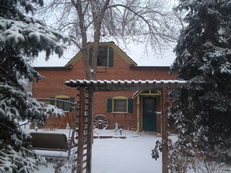 Our cozy cottage blanketed in snow. *swoon*